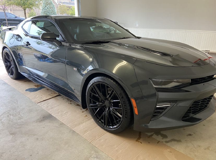 A charcoal Camaro SS gleaming after a Lux Lab detail.
