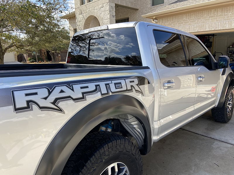 A silver Ford Raptor detailed and protected by Lux Lab.